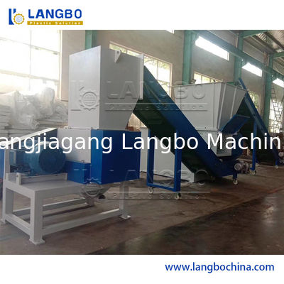 Dubbele schacht Afval van karton Papierband Rubber Metalen schroot Houtblokken Vaten Drums Pipe en Plastic Shredder voor recycling machine